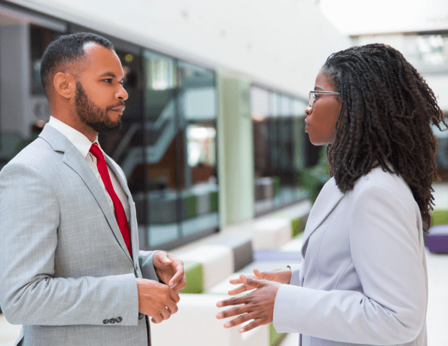 A mentor reviewing work with a club member